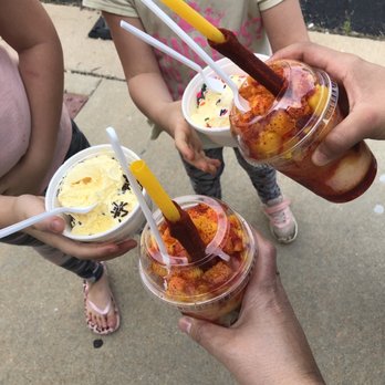 La Michoacana - a group of people holding drinks - Ice Cream & Frozen Yogurt Near Me - Romeoville, Illinois