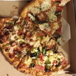 HUGE slices you can get of any of their specialties pizzas HUGE slices you can get of any of their specialties pizzas