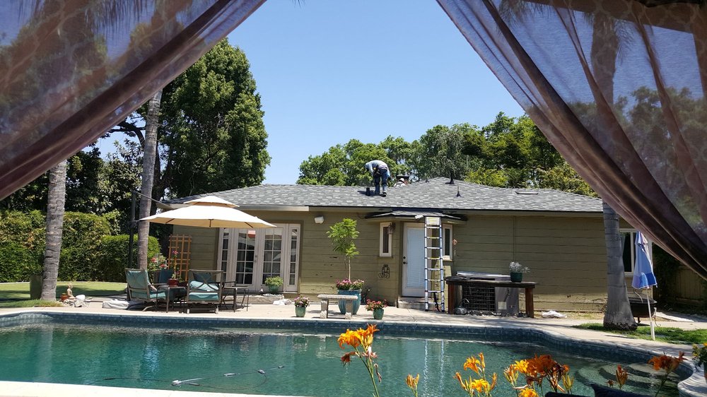 Slide of Green's Roofing