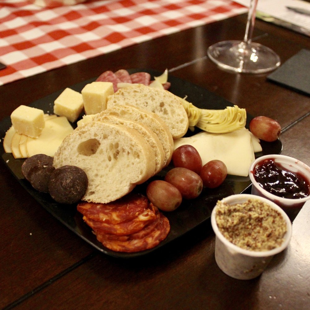 Oak Mountain Winery - Meat, cheese, bread, grapes, olives and chocolate wine paring tray that you get with the tour. - Wineries Near Me - Temecula, California Oak Mountain Winery - Meat, cheese, bread, grapes, olives and chocolate wine paring tray that you get with the tour. - Wineries Near Me - Temecula, California