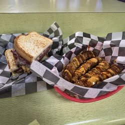 13Th Frame Grill - Pastrami sandwich with corn ribs; A1