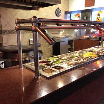 King Buffet - Small round grill where cook does on dish at a time. You select foods and sauces. - Chinese Near Me - North Platte, Nebraska