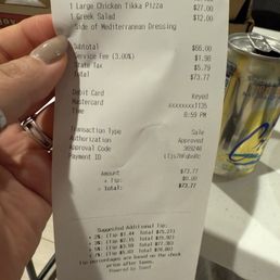 $73.77 for 2 L (they were really a M) Pizzas and 1 Greek Salad - this is criminal