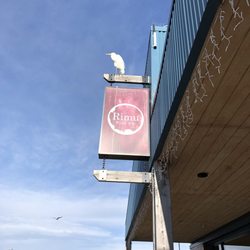 Rimu Wine Bar - White heron on Rimu sign