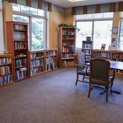 Lemay Avenue Health & Rehabilitation Facility - An activities room with large library and games at Lemay Avenue Health & Rehab.