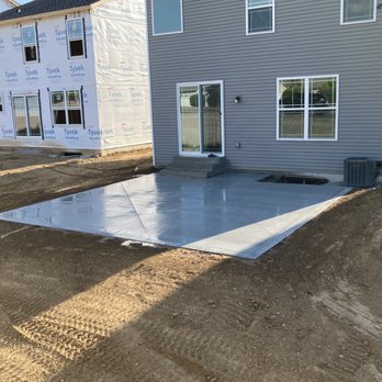Ryan's Express Complete Lawn Service - a concrete patio being poured - Tree Services Near Me - Ellisville, Missouri Ryan's Express Complete Lawn Service - a concrete patio being poured - Tree Services Near Me - Ellisville, Missouri