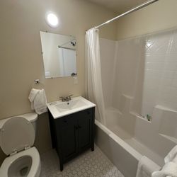 Lake Lodging Motel - Very clean bathroom with tub and great hot water; soap and small shampoo and conditioner. No hair dryer