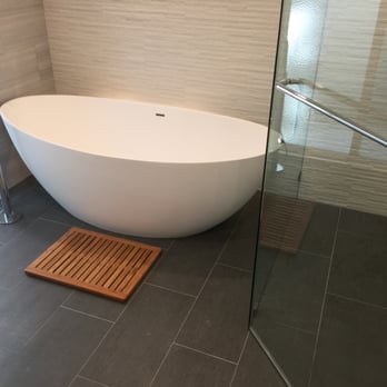 CSCI Construction - a bathtub and shower in a bathroom - General Contractors Near Me - Santa Clara, California CSCI Construction - a bathtub and shower in a bathroom - General Contractors Near Me - Santa Clara, California