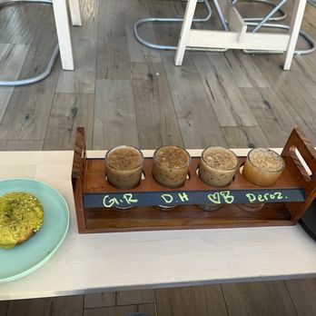 Contra Coffee & Tea - Coffee flight, pistachio donut and strawberry shortcake mochi donut - Coffee & Tea Near Me - Orange, California Contra Coffee & Tea - Coffee flight, pistachio donut and strawberry shortcake mochi donut - Coffee & Tea Near Me - Orange, California