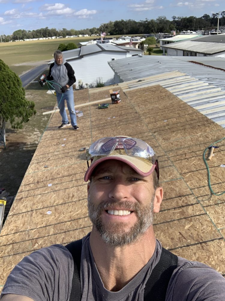 Slide of Tampa Roof Repair