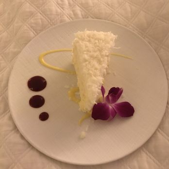 Halekulani Hotel - Famous coconut cake. Pretty darn good - Hotels Near Me - Honolulu, Hawaii