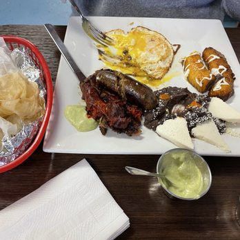 Chiroys Cafe - Chiroy Combination Guatemalan breakfast (churrasco, longaniza, chorizo, beans, eggs, fried plantain, and tortillas) - Breakfast & Brunch Near Me - Spring Valley, California Chiroys Cafe - Chiroy Combination Guatemalan breakfast (churrasco, longaniza, chorizo, beans, eggs, fried plantain, and tortillas) - Breakfast & Brunch Near Me - Spring Valley, California
