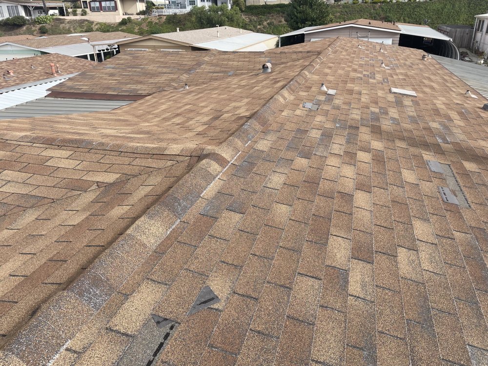 Slide of Balam Roofing