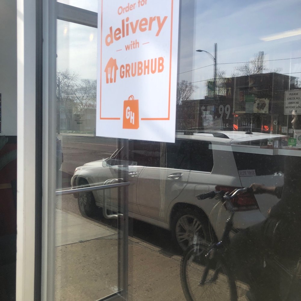 a delivery truck and a bicycle a delivery truck and a bicycle