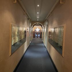 Hallway towards the front entrance where they had gold plated mail boxes.