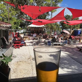Big Top Brewing - This is the view from the deck overlooking the patio area and food truck. - Breweries Near Me - Sarasota, Florida Big Top Brewing - This is the view from the deck overlooking the patio area and food truck. - Breweries Near Me - Sarasota, Florida
