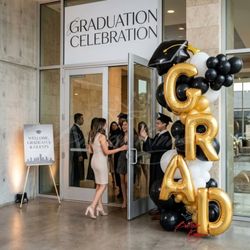 Balloon Kings - Graduation balloon tower in Uptown Dallas with custom colors and GRAD Letters, perfect for party decor and celebration for your Graduate.