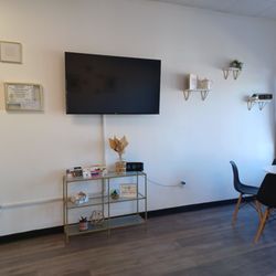 The Daily Blend - Big screen TV in seating area.