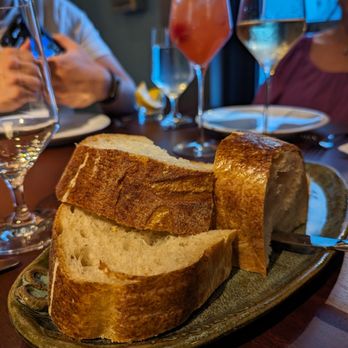 Little’s Oyster Bar - Bread with Rose Colored Glasses cocktail in the background - Seafood Near Me - Houston, Texas Little’s Oyster Bar - Bread with Rose Colored Glasses cocktail in the background - Seafood Near Me - Houston, Texas