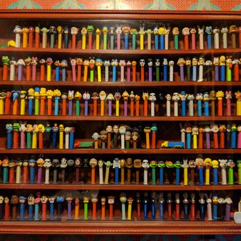 Julians - Pez bathroom display - New American Near Me - Providence, Rhode Island