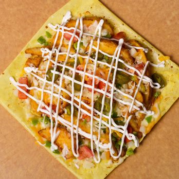 Craving Pizza - Loaded Potato Wedges:-

Seasoned Potato wedges, mozzarella, cheddar, green pepper, onion, tomato, jalapeno, hot sauce and sour cream. - Pizza Near Me - San Jose, California