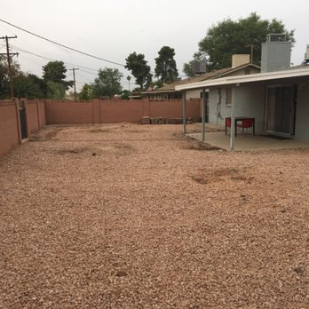 Frank's Demo Grading and Hauling - Before...Lots of Pink Coral Rock. - Demolition Services Near Me