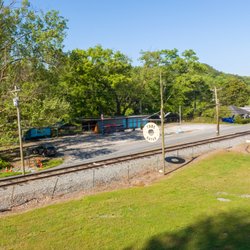 Toccoa River Tubing Company - Overflow Parking - across street from the outpost.  Follow RR crossing signs to your right to get to outpost.