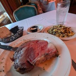 Princess Cafe - Prime Rib, medium rare, perfect! Ignore the dark portion it isn't over cooked, it's a shadow from me blocking the light. Great meal tonight.