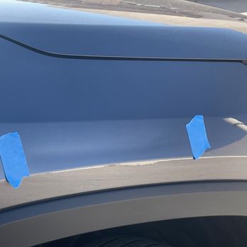 Fix-A-Dent Now  - Blue tape illustrates the start and finish of the dent - Mobile Dent Repair Near Me