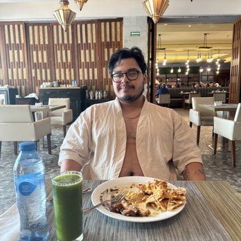 Dreams Playa Mujeres - Me eating Chilaquiles and drinking green juice - Hotels Near Me - Cancun, ROO Dreams Playa Mujeres - Me eating Chilaquiles and drinking green juice - Hotels Near Me - Cancun, ROO