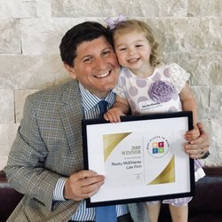 Rocky McElhaney Law Firm: Car Accident & Injury Lawyers - Rocky McElhaney and daughter winning the Nashville Business Journal's Best Places to Work Award four years running!