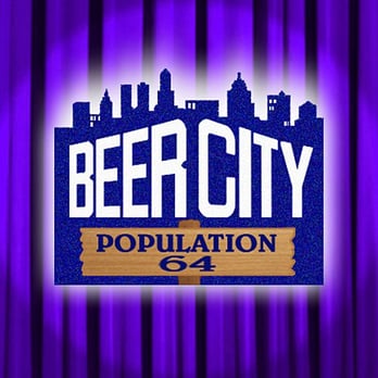 Beer City - a purple curtain with a city skyline in the background - Lounges Near Me - Omaha, Nebraska