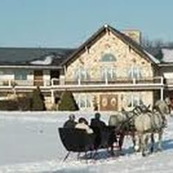 Guggisberg Swiss Inn - Sleigh Ride in front of Inn in the winter. We need a 4" base to start these rides.