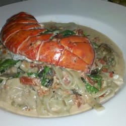 Shango New Orleans Bistro / Wine Bar - Black Pepper linguini, lobster tail meat, jumbo sea scallops, wild mushrooms, tomatoes, arugula, cognac cream sauce.. 25