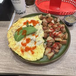 I had this California omelette. Wife had a stack of pineapple coconut pancakes!!