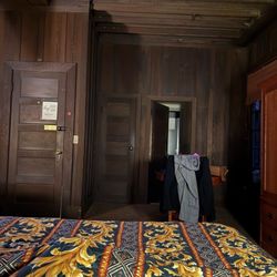 The Faculty Club - View from bed looking toward door and bathroom