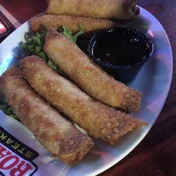 Original Roadhouse Grill - Texan Egg Rolls...Just Fried Cream Cheese with Jalapeño Pieces with side of Jalapeño Jelly - Steakhouses Near Me - Gresham, Oregon