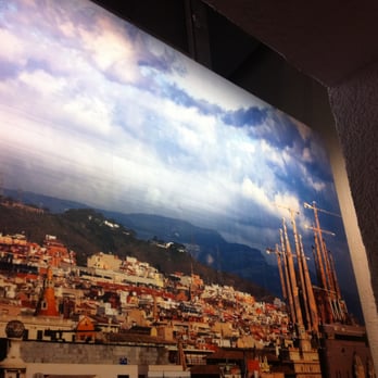 Hotel Curious - "view" from room of Barcelona skyline (actually a fake window with a photo) - Hotels Near Me - Barcelona, B Hotel Curious - "view" from room of Barcelona skyline (actually a fake window with a photo) - Hotels Near Me - Barcelona, B