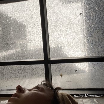Le Botaniste - Me cozily meditating on my food under a rainy sky roof. Other patrons here but I felt so much peace and spaciousness as I ate. - Wine Bars Near Me - New York, New York