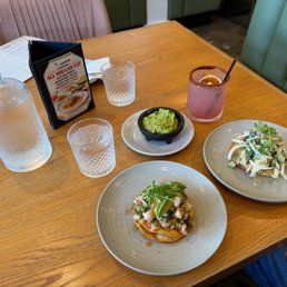Shrimp marinero ceviche and aguachile verde camarones ceviche along with guacamole and pomegranate margarita