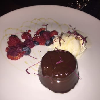 Colonel Mustard In The Courthouse - Orange infused chocolate ganache, raspberry foam, vanilla ice cream and honey drizzle - Bars Near Me - Hamilton, SLK