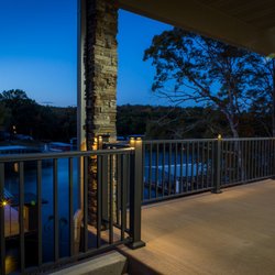Madden Manufacturing - Bronze Aluminum Baluster Railing with LED post caps.