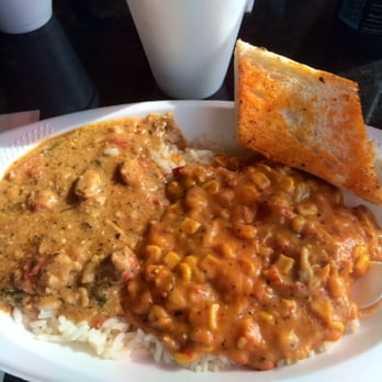 Yats Grandview - Drunken chicken and Maque Choux w/Crawfish over white rice, with side of garlic bread (very good combination) - Cajun/Creole Near Me - Columbus, Ohio