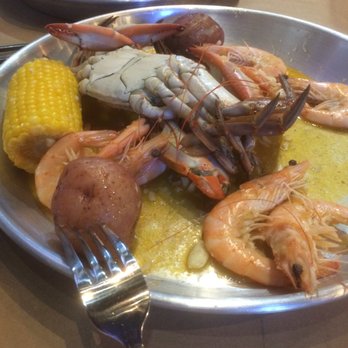 Mr. & Mrs Crab - Blue crab and head-on shrimp in garlic butter. - Seafood Near Me - Bradenton, Florida