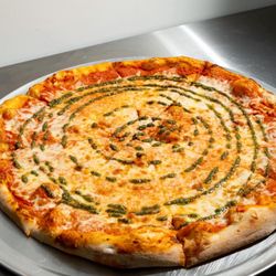 Come try our Vodka Pesto pizza! Made with vodka sauce, fresh mozzarella cheese and pesto.