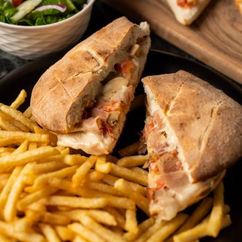Sam's Pizzeria & Cantina - Try our focaccia sandwiches filled with a taste of italy. Filling on it's own or add fries or salad for the extra hungry. - Pizza Near Me - Windsor, Ontario Sam's Pizzeria & Cantina - Try our focaccia sandwiches filled with a taste of italy. Filling on it's own or add fries or salad for the extra hungry. - Pizza Near Me - Windsor, Ontario