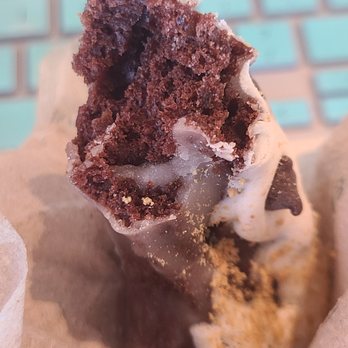 Krispy Kreme - a chocolate cupcake with a bite taken out of it - Coffee & Tea Near Me - Menifee, California Krispy Kreme - a chocolate cupcake with a bite taken out of it - Coffee & Tea Near Me - Menifee, California