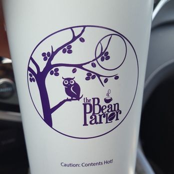 The Bean Parlor - a hand holding a coffee cup - Coffee & Tea Near Me - Vicksburg, Mississippi