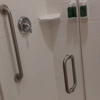Courtyard by Marriott Mankato - Nice size shower with good water pressure. Shampoo, conditioner, and body wash are proved in dispensers. - Hotels Near Me - Mankato, Minnesota