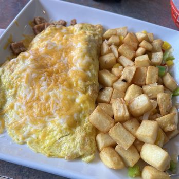 Julio's grill - Sausage and cheese omelette with (frozen) country potatoes - Mexican Near Me - Burney, California Julio's grill - Sausage and cheese omelette with (frozen) country potatoes - Mexican Near Me - Burney, California